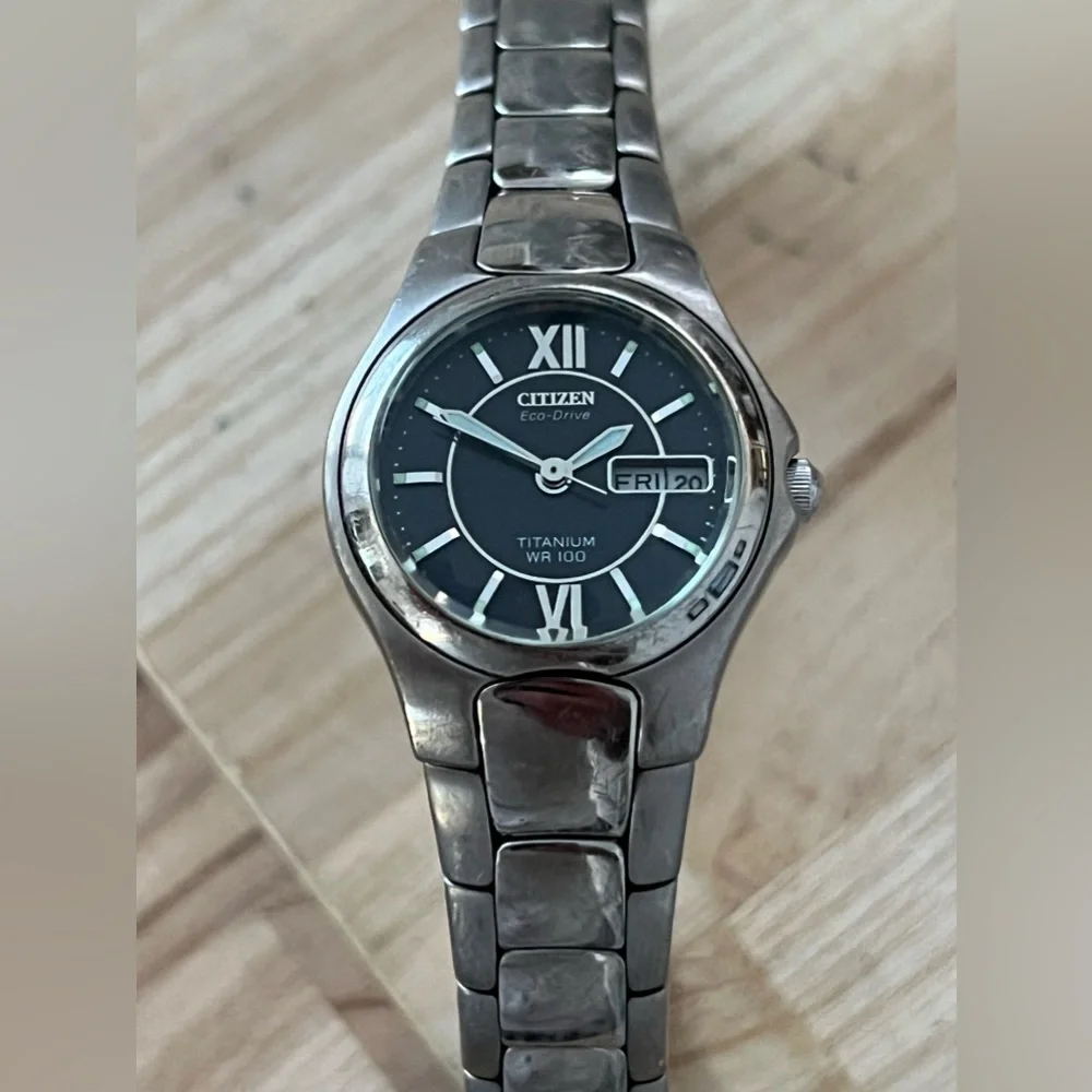 Citizen Eco-Drive Titanium Solar Black Dial Day Date Window Titanium Bracelet